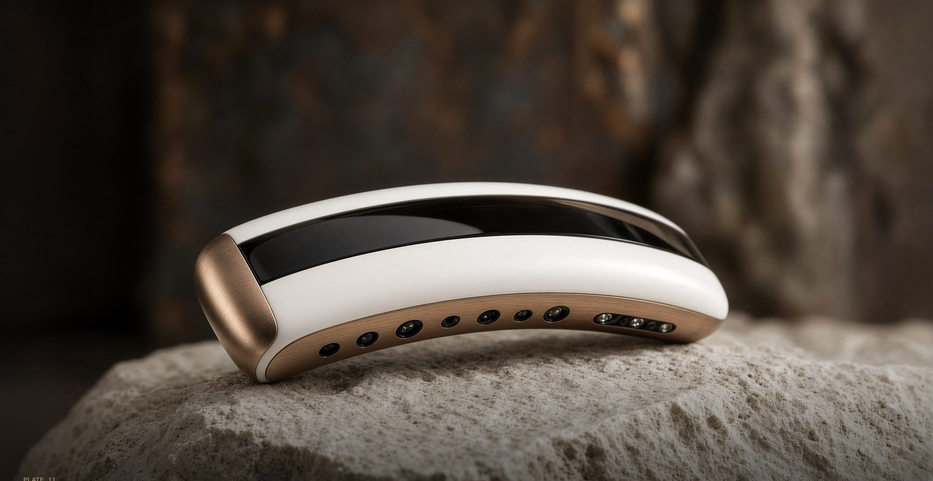The NEO Halo wearable resting on stone.